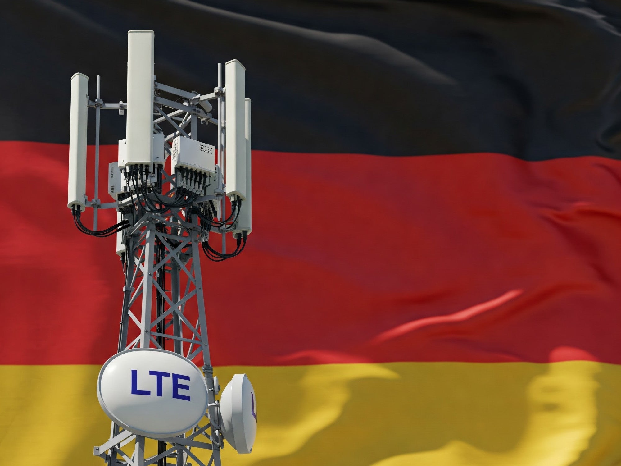 LTE-Basisstation vor dem Hintergrund einer Deutschland-Flagge.