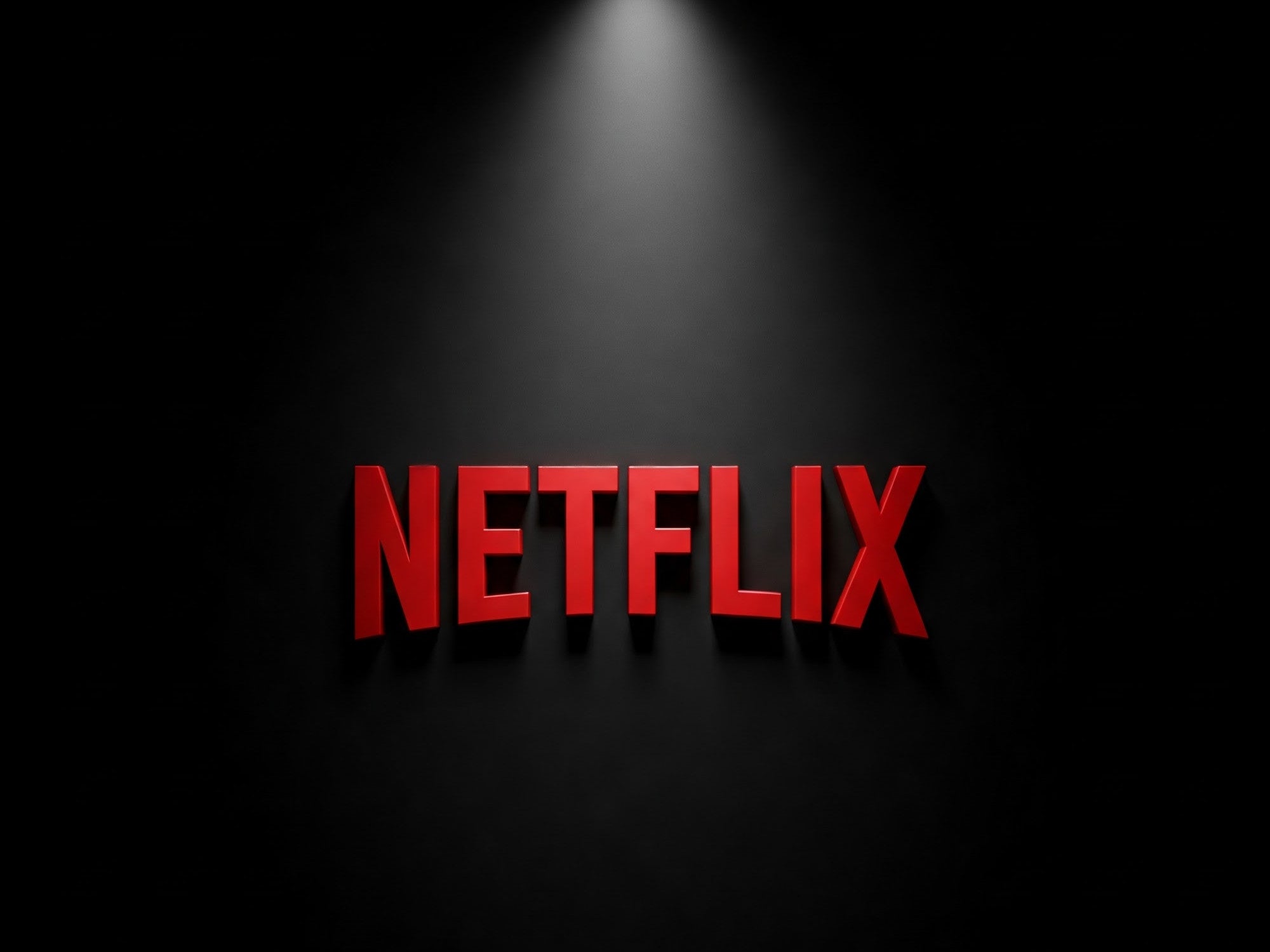 Netflix-Logo im Scheinwerferlicht.