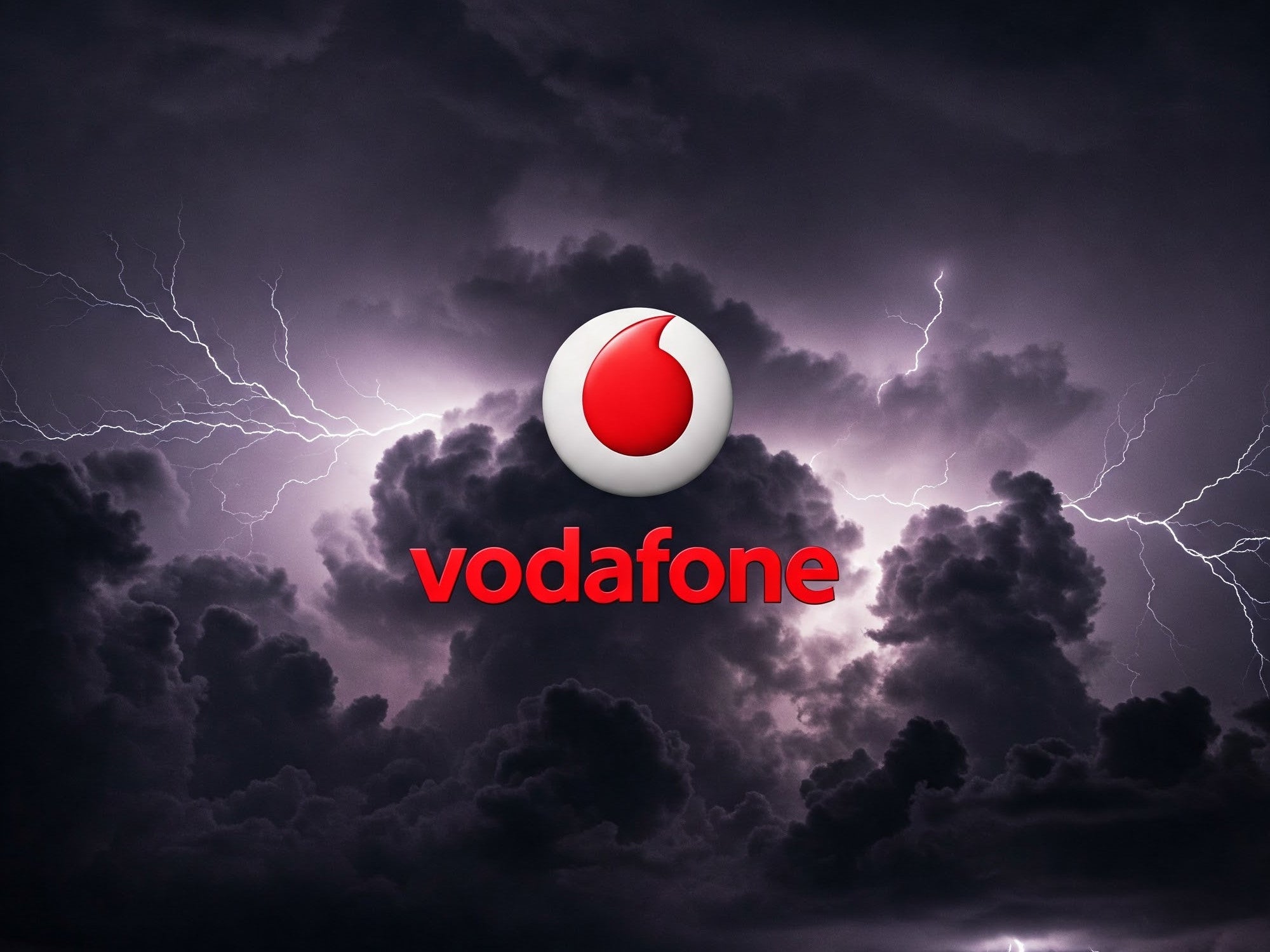 Vodafone-Logo vor Gewitterwolken.